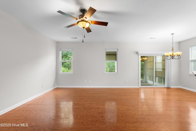 280 Coralstone Ct, Leland, NC 28451 - empty room with light wood-type flooring and healthy amount of natural light