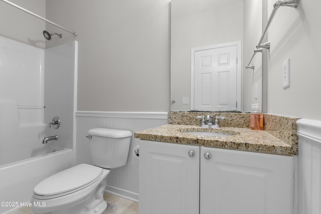 280 Coralstone Ct, Leland, NC 28451 - bathroom featuring wainscoting, vanity, shower / bath combination, and toilet