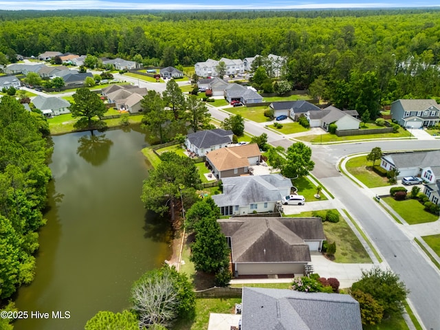 280 Coralstone Ct, Leland, NC 28451 - aerial perspective of suburban area with a forest and a nearby body of water