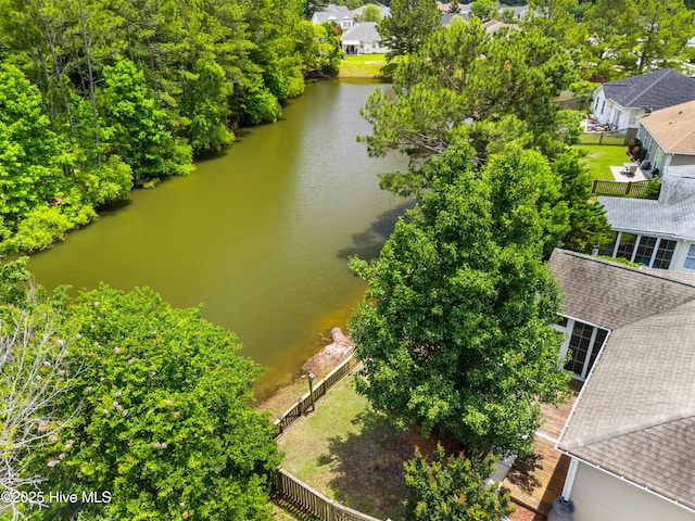 280 Coralstone Ct, Leland, NC 28451 - aerial view of residential area featuring a large body of water and a tree filled landscape