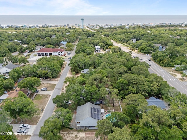 109 NE 1st St, Oak Island, NC 28465 - bird's eye view of a large body of water and a tree filled landscape