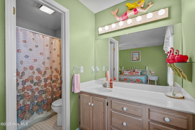 109 NE 1st St, Oak Island, NC 28465 - bathroom featuring vanity, toilet, tile patterned floors, and curtained shower