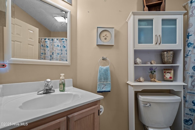 109 NE 1st St, Oak Island, NC 28465 - full bathroom featuring vanity, toilet, and a shower with shower curtain