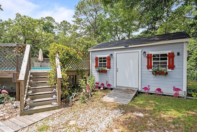 109 NE 1st St, Oak Island, NC 28465 - view of shed featuring stairway