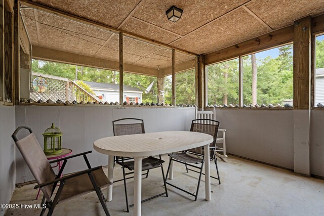 109 NE 1st St, Oak Island, NC 28465 - sunroom with outdoor dining area