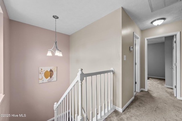 206 Lansing Ct, Jacksonville, NC 28540 - hallway with an upstairs landing, carpet floors, and baseboards
