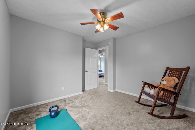 206 Lansing Ct, Jacksonville, NC 28540 - living area with a ceiling fan, carpet floors, and baseboards