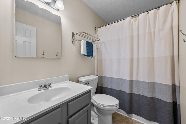 206 Lansing Ct, Jacksonville, NC 28540 - bathroom with toilet, vanity, a textured ceiling, tile patterned floors, and a shower with shower curtain