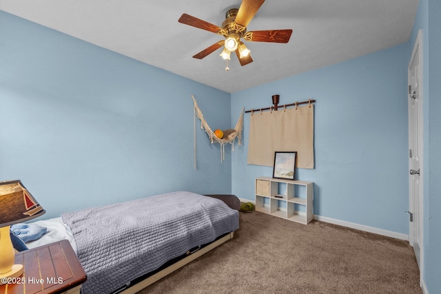 206 Lansing Ct, Jacksonville, NC 28540 - bedroom with carpet, baseboards, and a ceiling fan