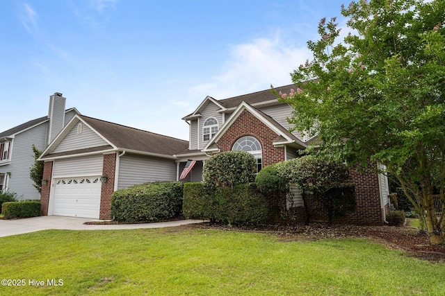 206 Lansing Ct, Jacksonville, NC 28540 - traditional-style home with brick siding, an attached garage, a front yard, and driveway