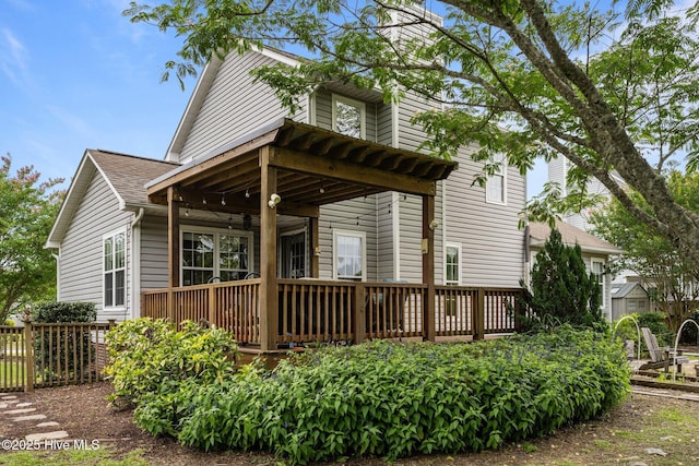 206 Lansing Ct, Jacksonville, NC 28540 - back of house featuring a deck and a shingled roof