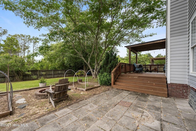 206 Lansing Ct, Jacksonville, NC 28540 - view of patio featuring an outdoor fire pit and a deck