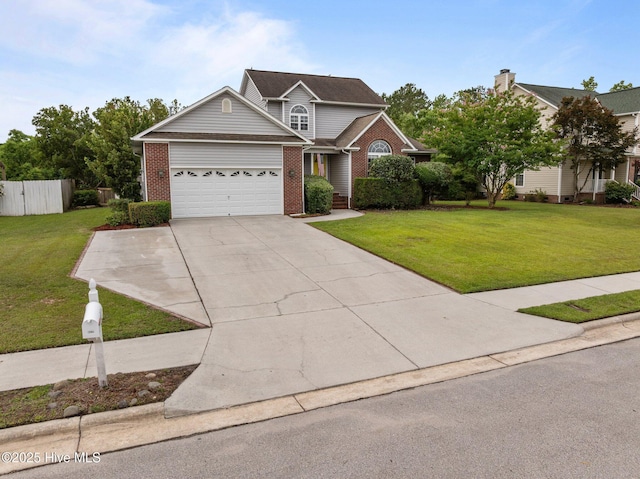 206 Lansing Ct, Jacksonville, NC 28540 - traditional-style house with an attached garage, brick siding, and concrete driveway