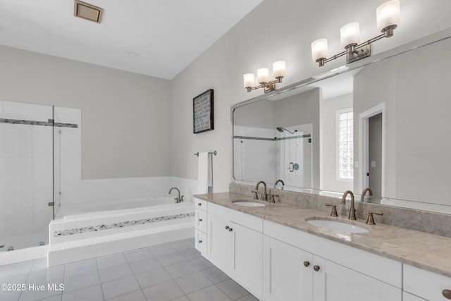2021 Seawind Ln, Wilmington, NC 28405 - full bathroom with a bath, double vanity, a shower, and tile patterned flooring
