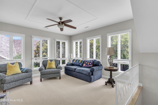 2021 Seawind Ln, Wilmington, NC 28405 - carpeted living room featuring attic access, ceiling fan, healthy amount of natural light, and baseboards
