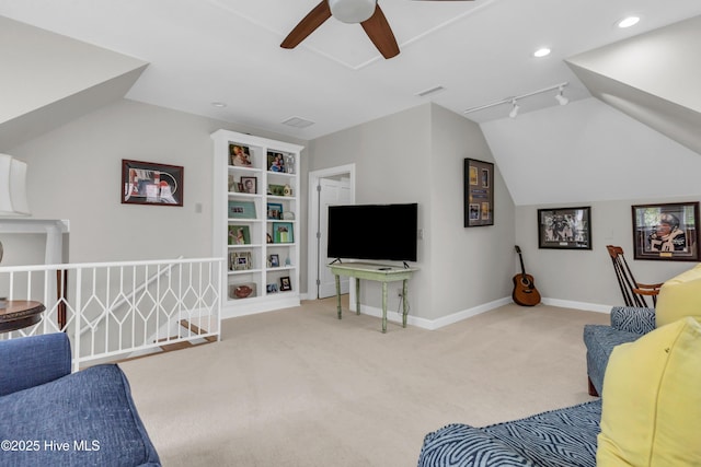2021 Seawind Ln, Wilmington, NC 28405 - living room with ceiling fan, vaulted ceiling, carpet flooring, baseboards, and recessed lighting