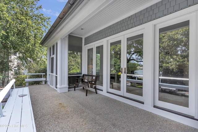 2021 Seawind Ln, Wilmington, NC 28405 - view of patio / terrace featuring french doors