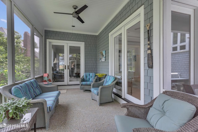 2021 Seawind Ln, Wilmington, NC 28405 - sunroom / solarium featuring french doors, outdoor lounge area, ceiling fan, and plenty of natural light