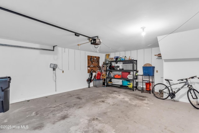2021 Seawind Ln, Wilmington, NC 28405 - garage with a garage door opener and baseboards