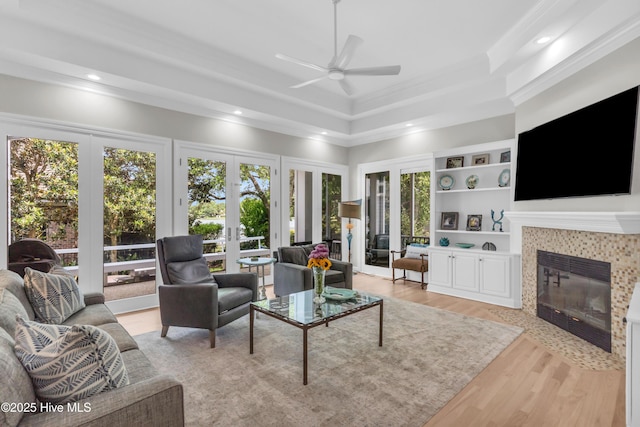 2021 Seawind Ln, Wilmington, NC 28405 - living room with ceiling fan, a fireplace, light wood-style floors, recessed lighting, and crown molding