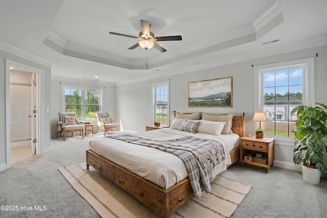 33 Chippewa Ln, Rocky Point, NC 28457 - carpeted bedroom featuring a raised ceiling, crown molding, baseboards, and ceiling fan