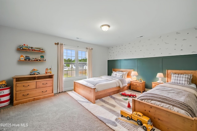 33 Chippewa Ln, Rocky Point, NC 28457 - bedroom featuring a decorative wall and light carpet