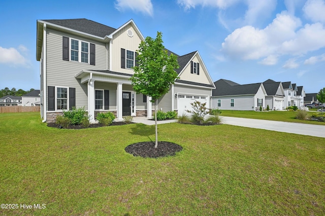 33 Chippewa Ln, Rocky Point, NC 28457 - traditional-style house with concrete driveway, a porch, board and batten siding, a front lawn, and stone siding