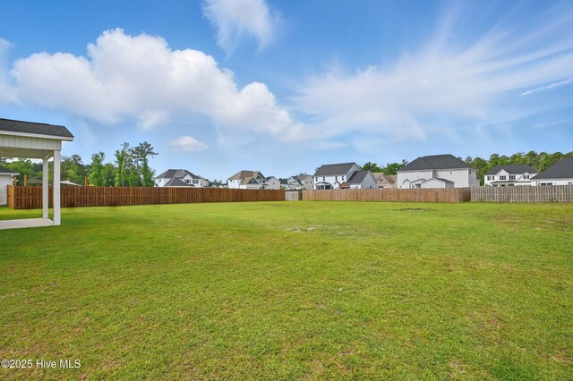 33 Chippewa Ln, Rocky Point, NC 28457 - view of yard featuring a residential view