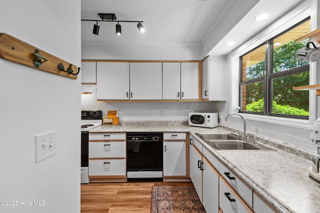 113 Sunshine Ln Unit C8, Winterville, NC 28590 - kitchen with white appliances, light countertops, crown molding, backsplash, and a sink