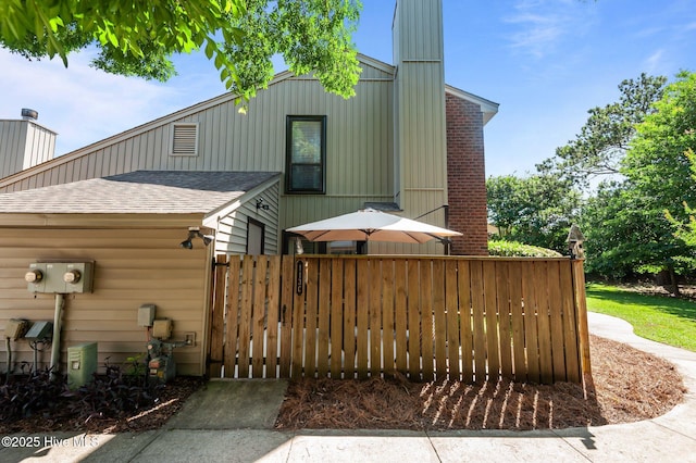 113 Sunshine Ln Unit C8, Winterville, NC 28590 - view of front of house featuring roof with shingles and a chimney