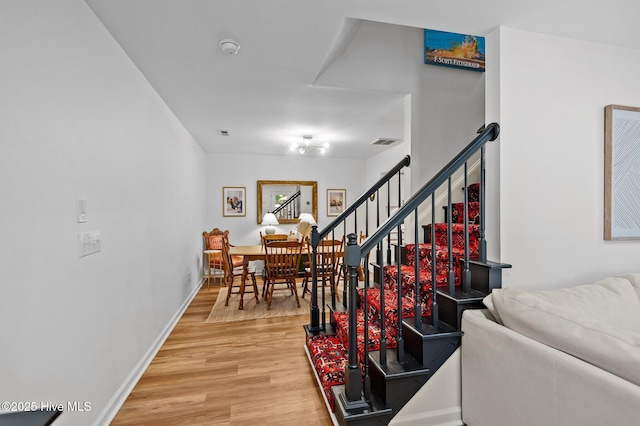 113 Sunshine Ln Unit C8, Winterville, NC 28590 - stairway with wood finished floors and baseboards