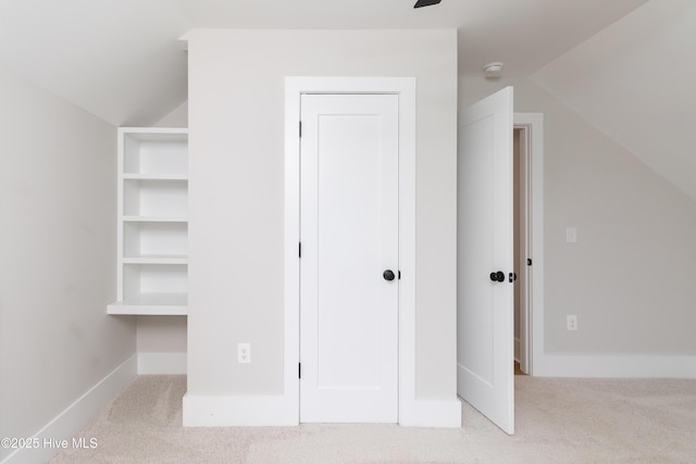 245 Winborne Ln, Edenton, NC 27932 - bonus room with lofted ceiling, carpet floors, and baseboards