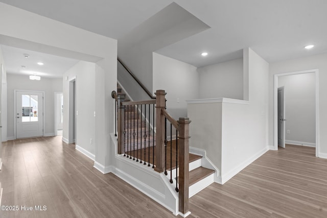 81 Eagle Claw Dr, Calabash, NC 28467 - stairway featuring wood finished floors, baseboards, and recessed lighting