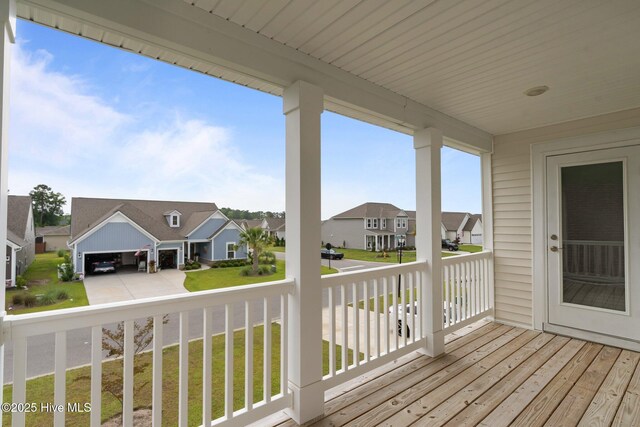 81 Eagle Claw Dr, Calabash, NC 28467 - wooden terrace with a residential view and a lawn
