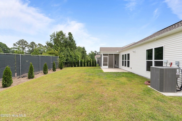 81 Eagle Claw Dr, Calabash, NC 28467 - view of yard featuring central AC, a sunroom, and a patio area