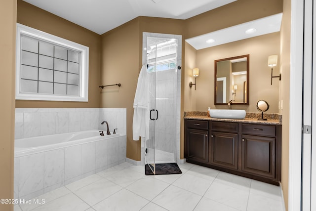 310 White Swan Ct, Wilmington, NC 28412 - full bathroom featuring vanity, a bath, a shower stall, and tile patterned floors