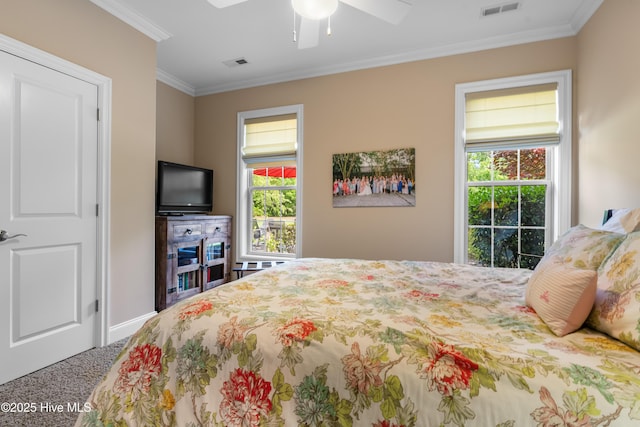 310 White Swan Ct, Wilmington, NC 28412 - bedroom featuring ornamental molding, carpet, baseboards, and ceiling fan