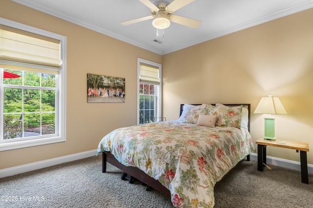 310 White Swan Ct, Wilmington, NC 28412 - carpeted bedroom featuring baseboards, multiple windows, crown molding, and ceiling fan