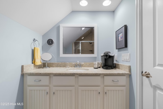 310 White Swan Ct, Wilmington, NC 28412 - full bathroom with vanity, lofted ceiling, and a shower