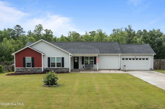 660 Riggs Rd, Hubert, NC 28539 - ranch-style house with a garage, concrete driveway, a porch, and a shingled roof