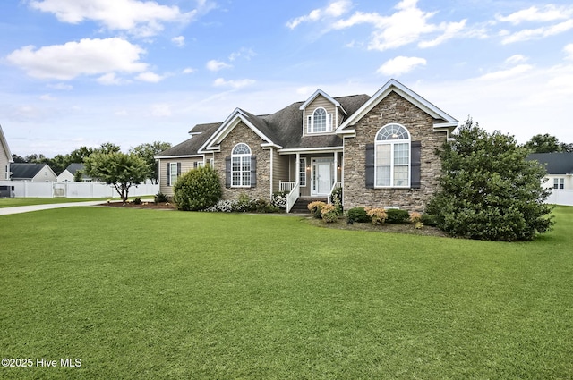 3509 Wales Pl N, Wilson, NC 27896 - traditional-style home with stone siding and a shingled roof