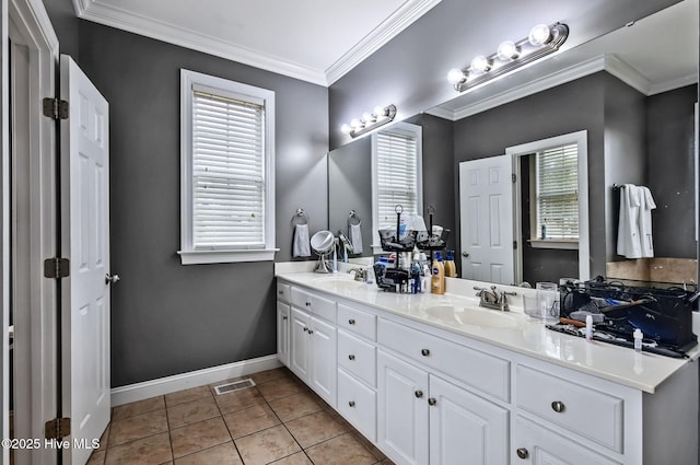 3509 Wales Pl N, Wilson, NC 27896 - full bathroom featuring double vanity, plenty of natural light, baseboards, tile patterned flooring, and crown molding