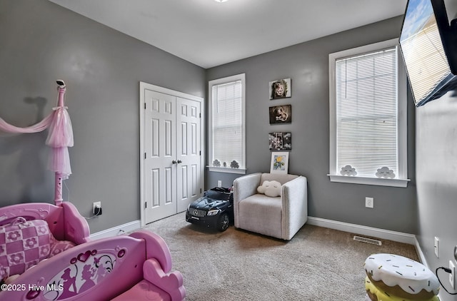 3509 Wales Pl N, Wilson, NC 27896 - bedroom featuring carpet and multiple windows