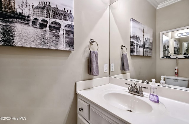 3509 Wales Pl N, Wilson, NC 27896 - bathroom featuring crown molding, vanity, and toilet