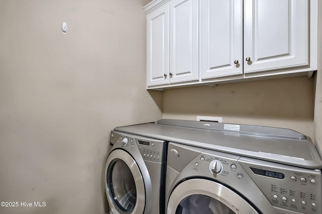 3509 Wales Pl N, Wilson, NC 27896 - laundry room featuring washing machine and clothes dryer and cabinet space