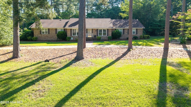 202 Forest Dr, Clinton, NC 28328 - ranch-style house featuring a front yard and brick siding