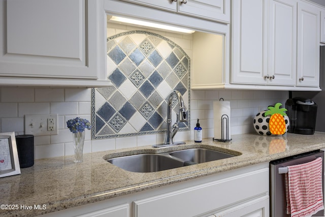 202 Forest Dr, Clinton, NC 28328 - kitchen with a sink, dishwasher, white cabinets, tasteful backsplash, and light stone countertops