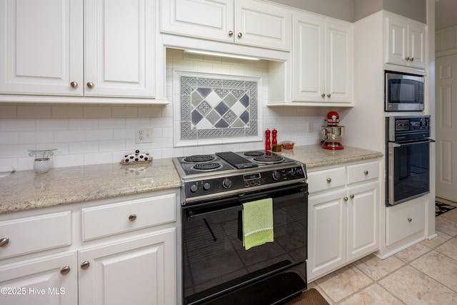202 Forest Dr, Clinton, NC 28328 - kitchen featuring black appliances, white cabinets, light tile patterned floors, and decorative backsplash