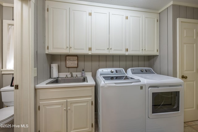 202 Forest Dr, Clinton, NC 28328 - washroom with separate washer and dryer and cabinet space
