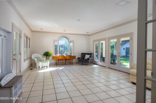 202 Forest Dr, Clinton, NC 28328 - sitting room featuring french doors, crown molding, a textured ceiling, and light tile patterned flooring